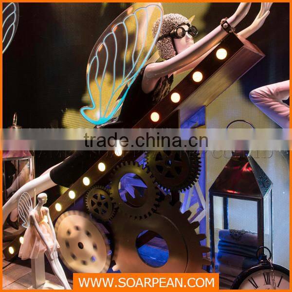 Life size fiberglass female mannequins with acrylic fluorescent wings
