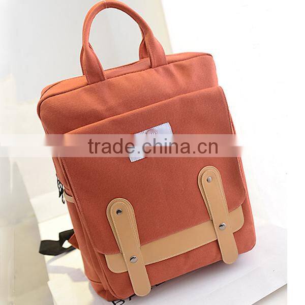 blue canvas travel backpack with laptop compartment