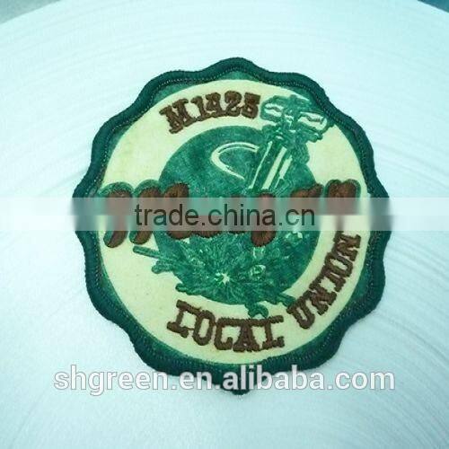 Eco-friendly green leaf-shaped iron on embroidery label