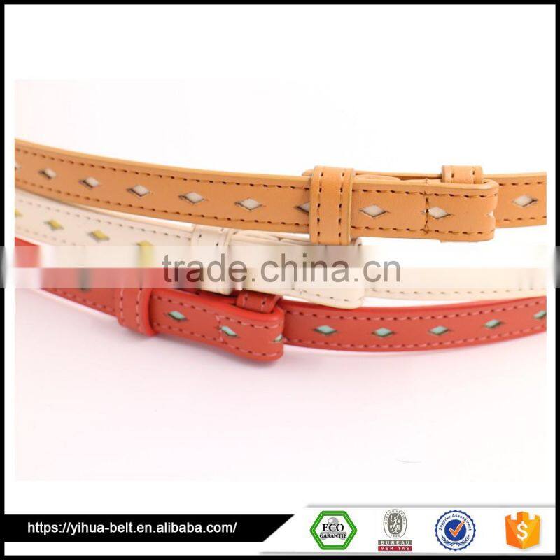 Fashionable metal buckle punching belt with holes