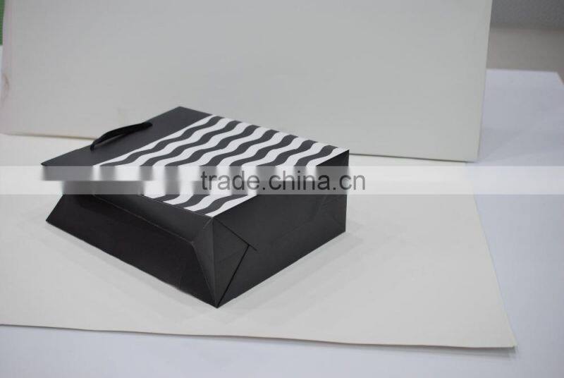 popular good looking new fancy black and white stripe paper gift bag with ribbon handle supplier and manufacture