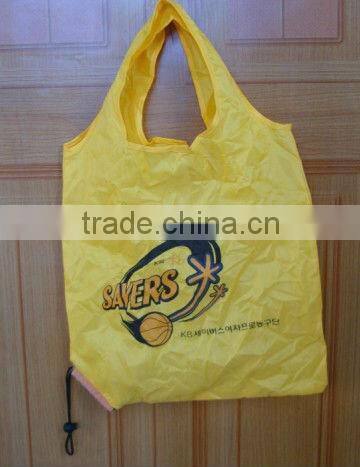 foldable shoping bag folded to itself pouch