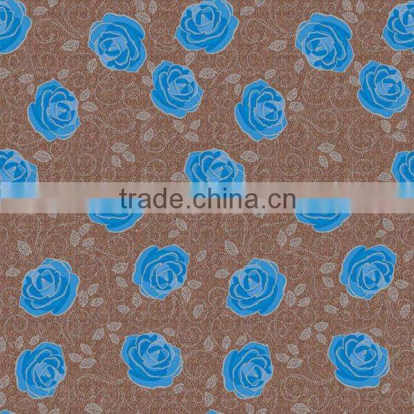 Laminated PVC table cloth with non-woven as backing.