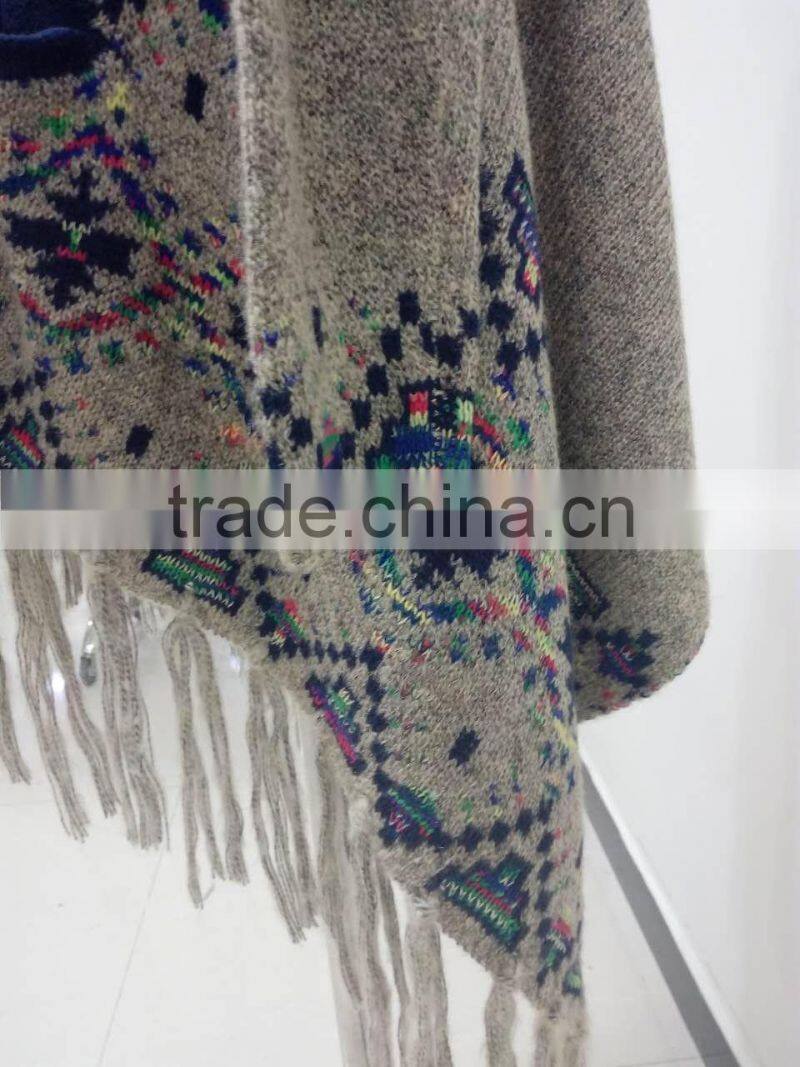 Ladies elegant multi color knitted cardigan with fringes