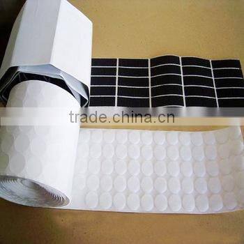 Adhesive industrial hook and loop dots