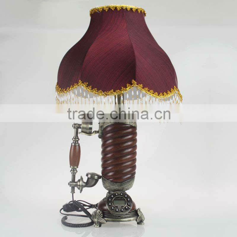 new antique telephone with desk lamp