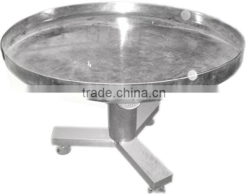 Unscrambling table in packing machine/collection table packing machines
