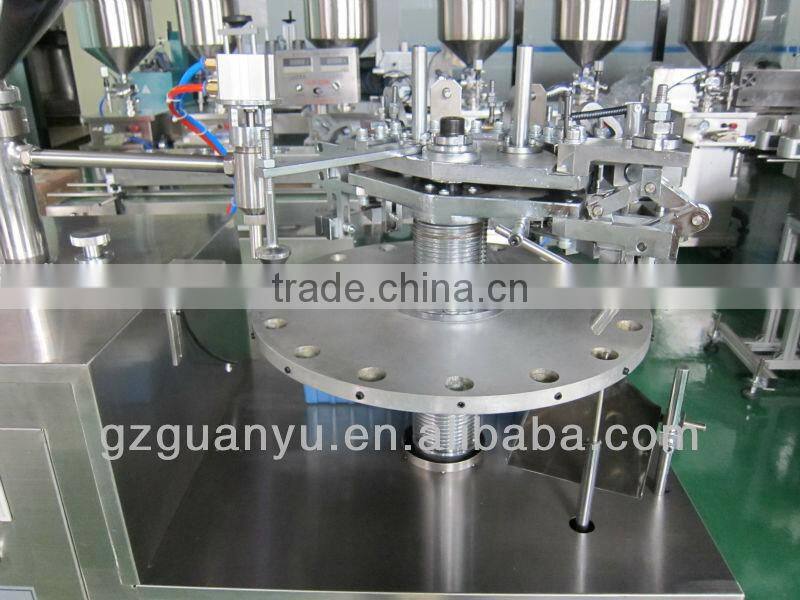Semi-automatic filling and sealing machine