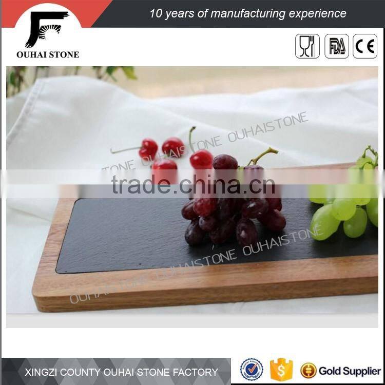 Romantic dinner high grade restaurant black slate wooden plate