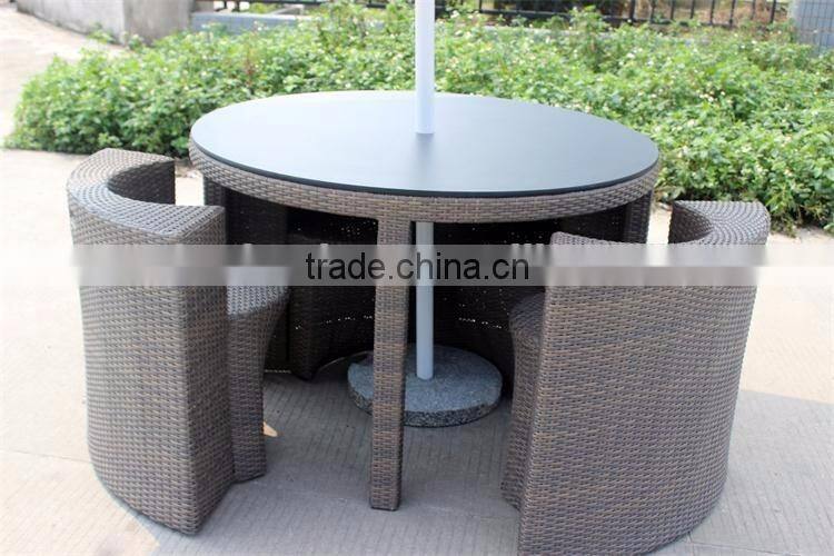Round patio dining set with umbrella