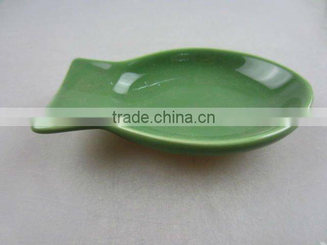 Stock green glazed porcelain fish shaped sauce dish