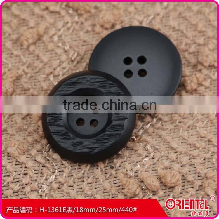 High end black plastic coat button with engrave pattern