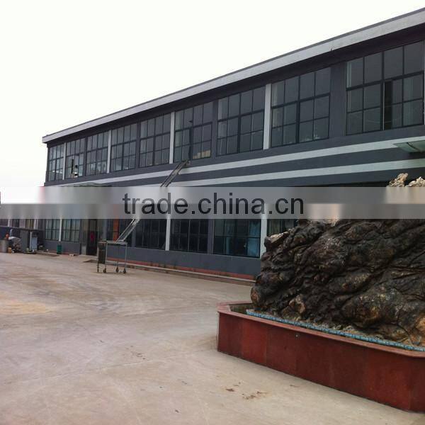 Short brim snapback hat with an adjustable plastic snapback strap closure