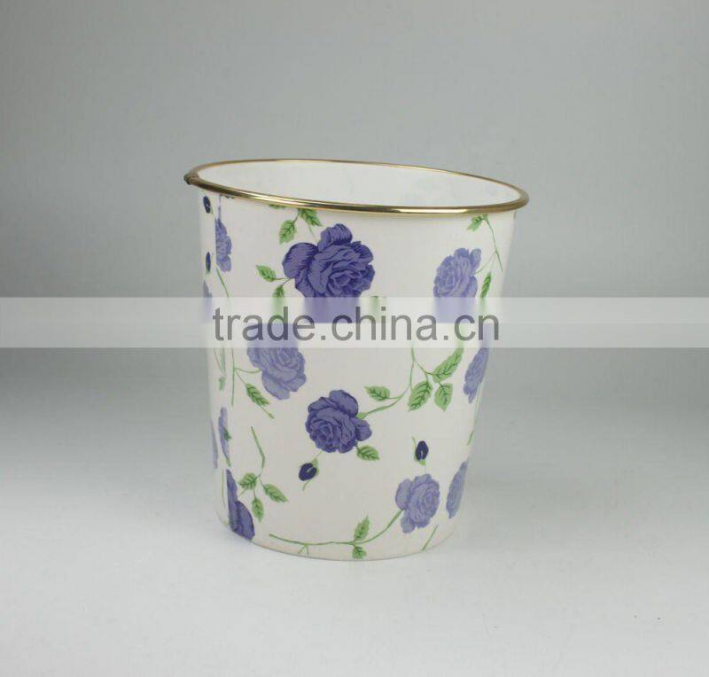 Plastic waste bin with golden edge