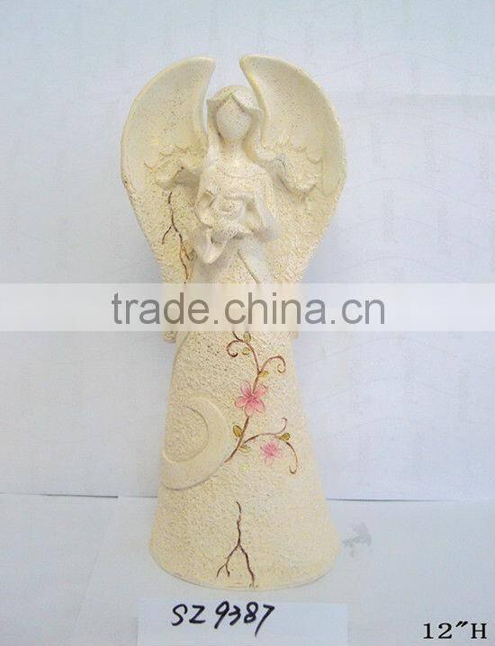 Resin fairy with a snail statue sculpture