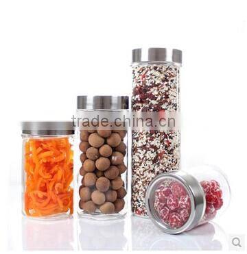 clear cylinder glass storage jar with air bubbles and stainless steel lid