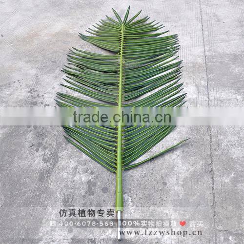 artificial plastic coconut palm leaves
