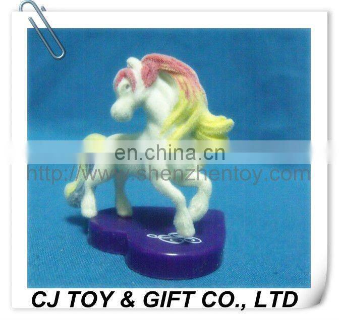 toy horse flocked