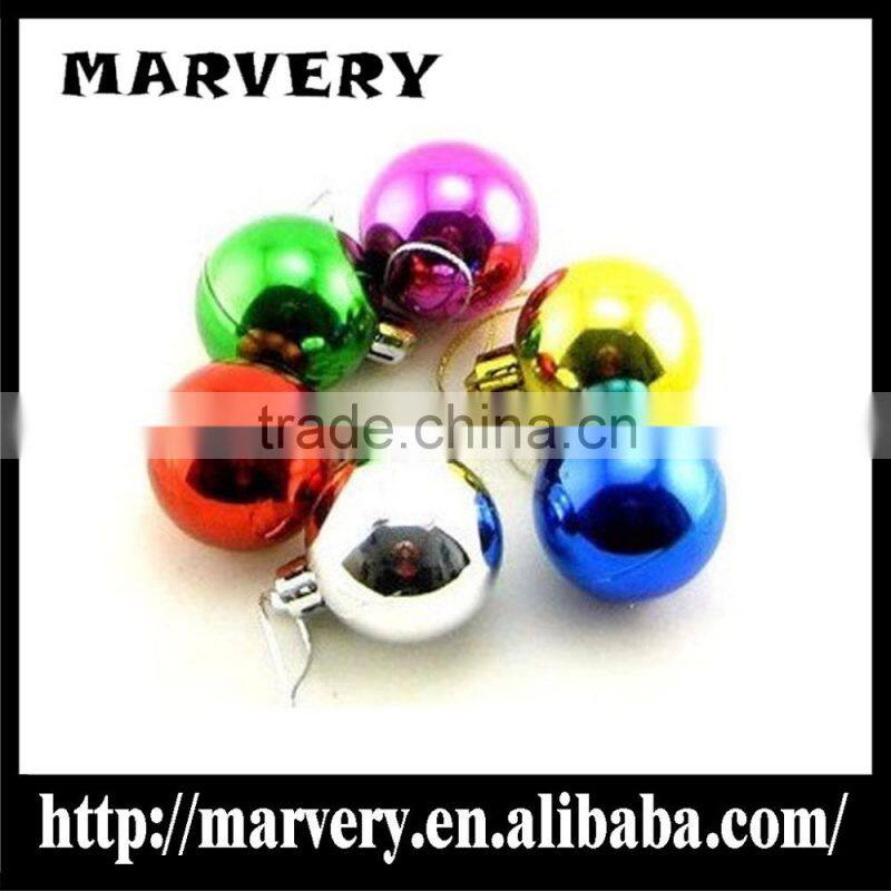 Christmas decorating the Christmas tree to hang Christmas ball pendant