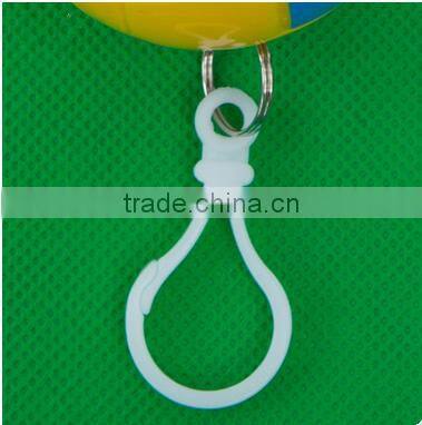 Portable golf ball style golf poncho