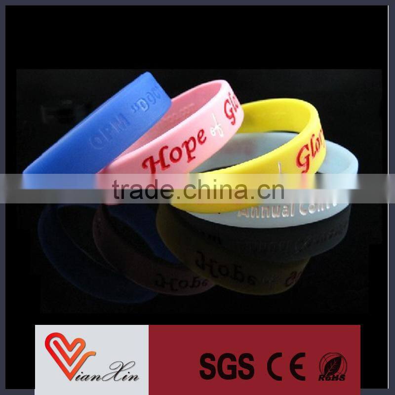 Cheap custom logo debossed Panton colorfill in silicone wristband no minimum order