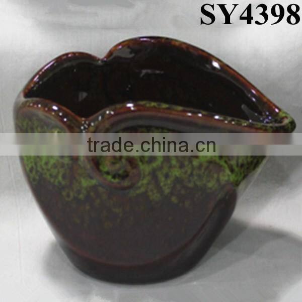 Glazed small colorful ceramic pot
