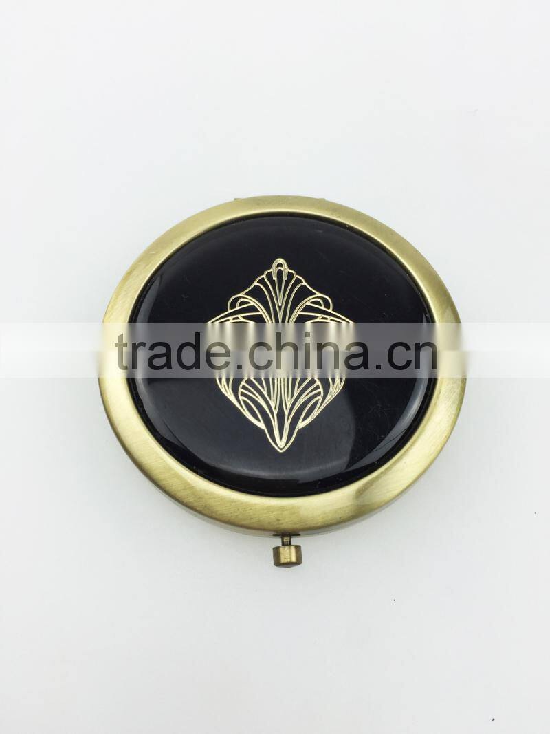 Hot sale metal bronze make up mirror with epoxy sticker