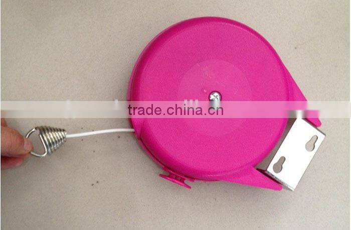 Wall mounted retractable washing clothes line