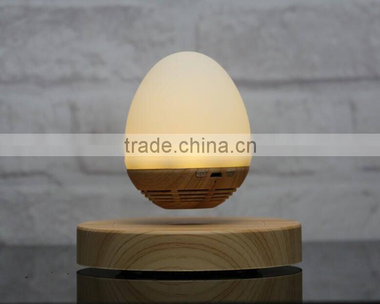 floating rotating bluetooth speaker with led light