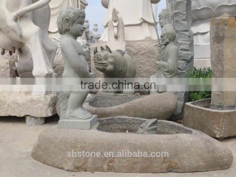River stone fountain with litter boy statue for garden decoration