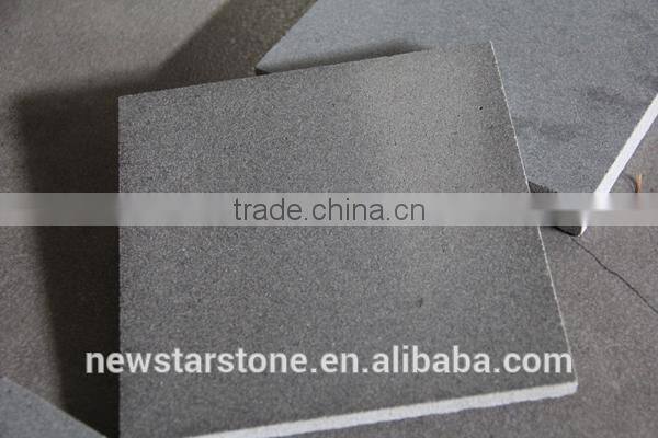 Honed grey andesite stone