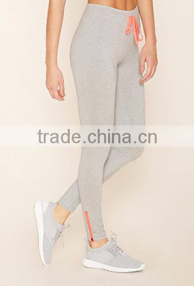 hot sale China women clothing custom yoga fashion elastic plain skinny zip leggings