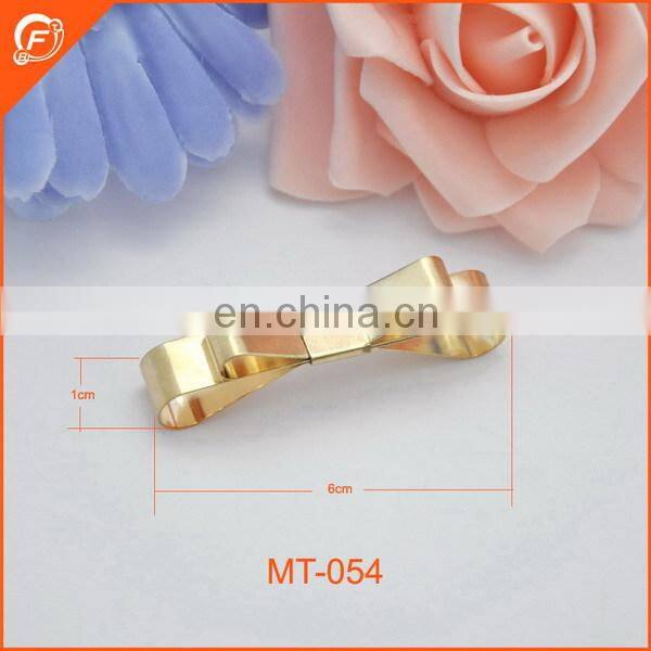 bowknot zinc alloy metal trimming in gold color for dresses