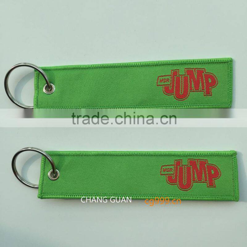 The green woven label key chains