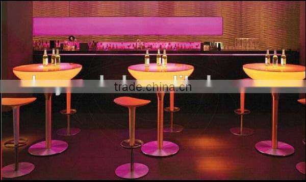Battery rechargeable LED plastic rotating round production table with legs metal