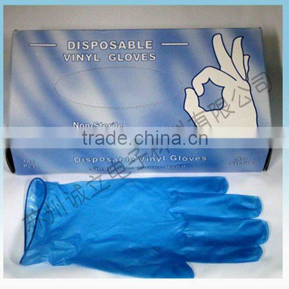 Blue disposable vinyl gloves