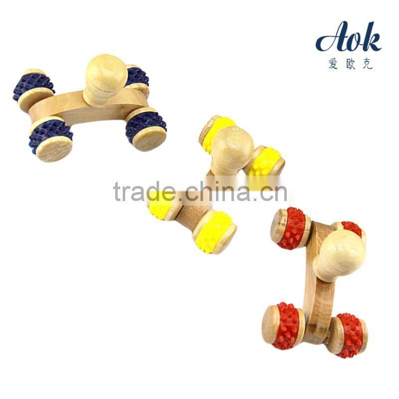 Hot selling straight-handle body massager with colorful plastic wheels
