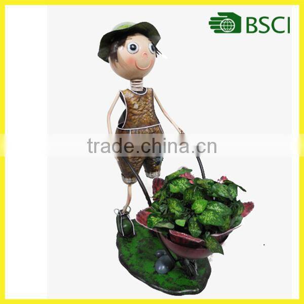 YS12197 Metal boy garden doll planter with a cart pot