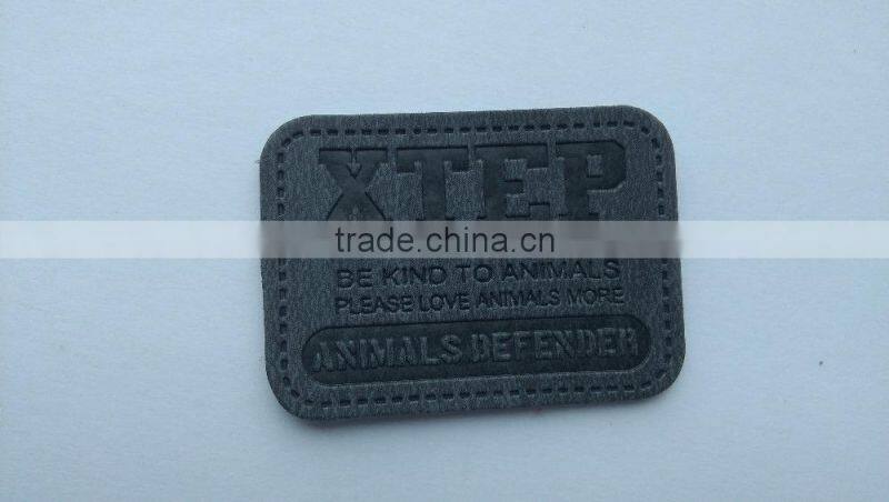 custom jeans black debossed patches