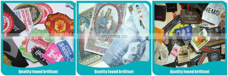 Heat transfer woven label for children's garment and toy