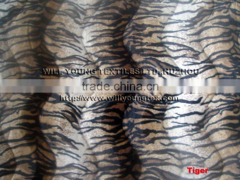 100% Polyester printed velboa fabric with animal design