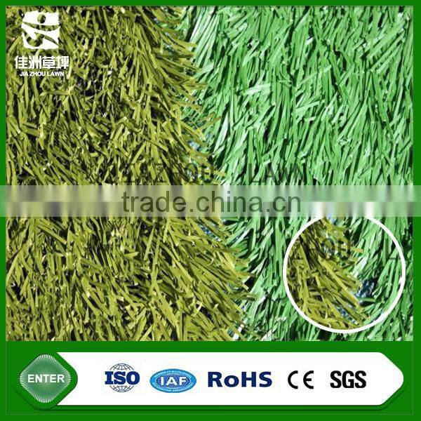 Synthetic plastic decorative track grass