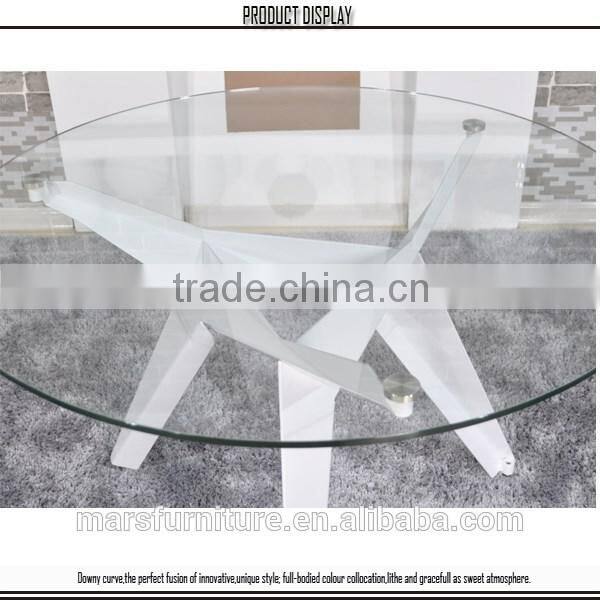 round glass table with metal legs