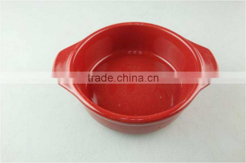 Stocklot red glaze ceramic round bakeware with handles