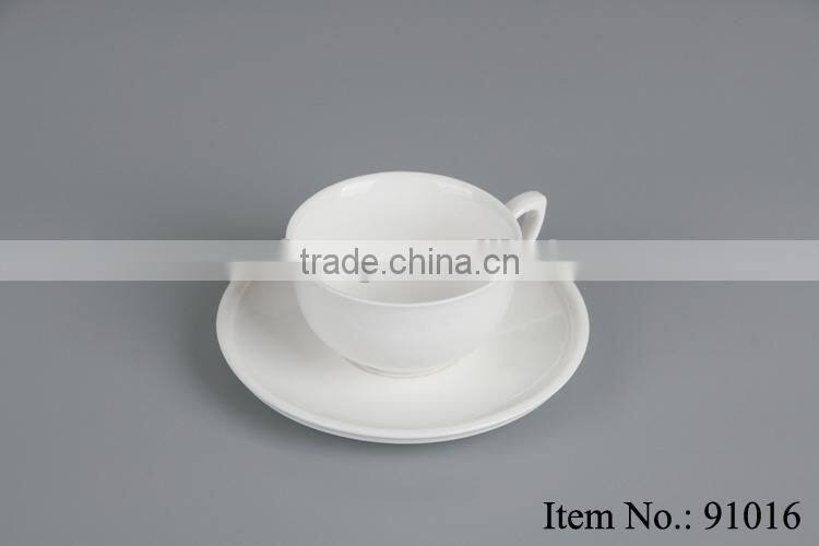 white chafing ceramic coffee cup with handle