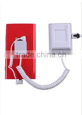 Security alarm charge retail display system for mobile phone