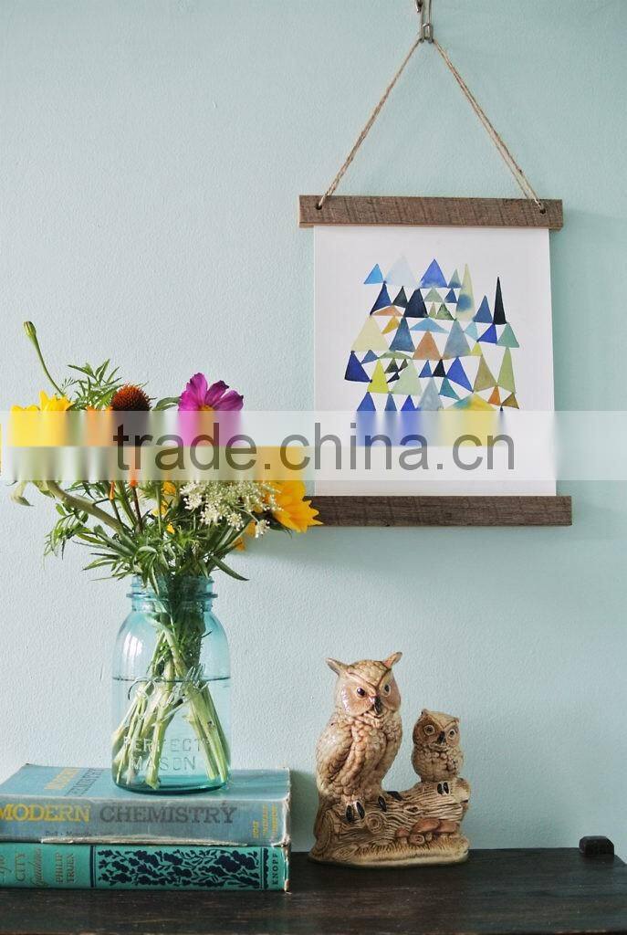 Wooden poster hanger