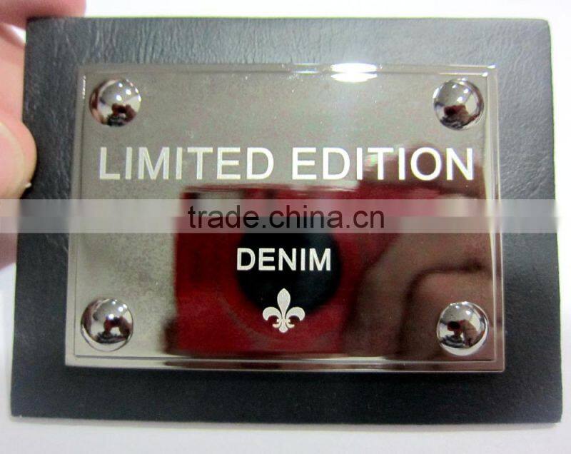 Embossed logo leather label for jeans
