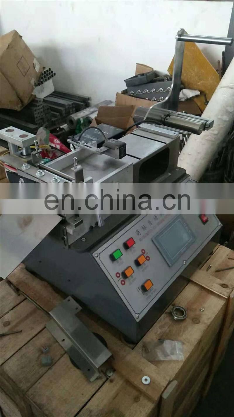 UGS2050 maquina Cortadora de Cinta Textil de Tela table top satin ribbon tape cutting machine