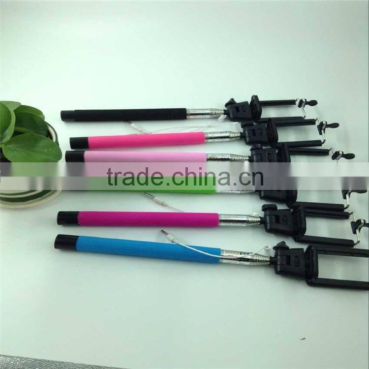 2016 new Guangzhou hot sale selfie stick with cable new design good quality mini selfie stick for photo taking